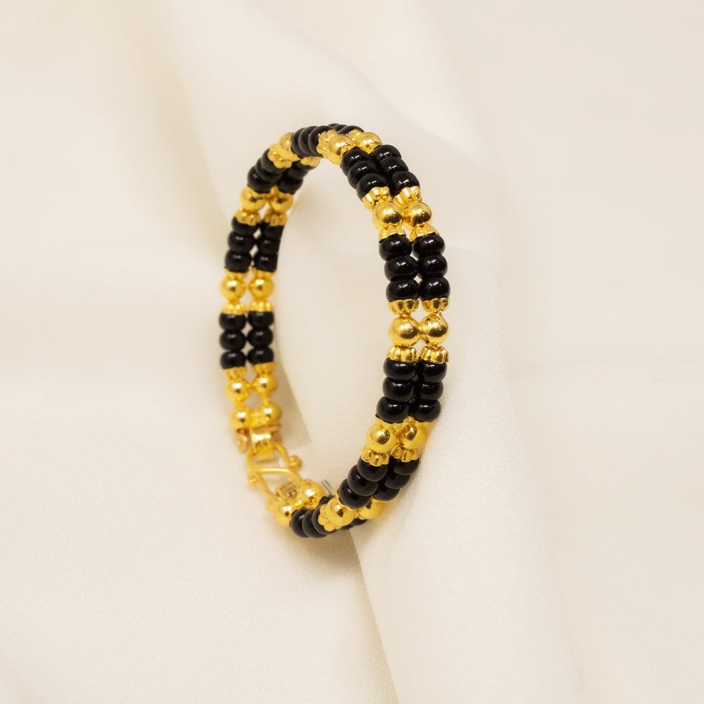 Gold black bead hot sale bracelet for babies indian