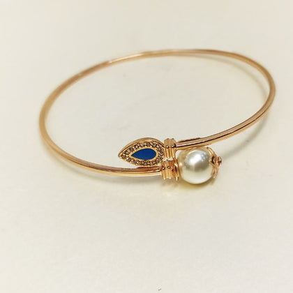 Pearl Bangle with Blue stone